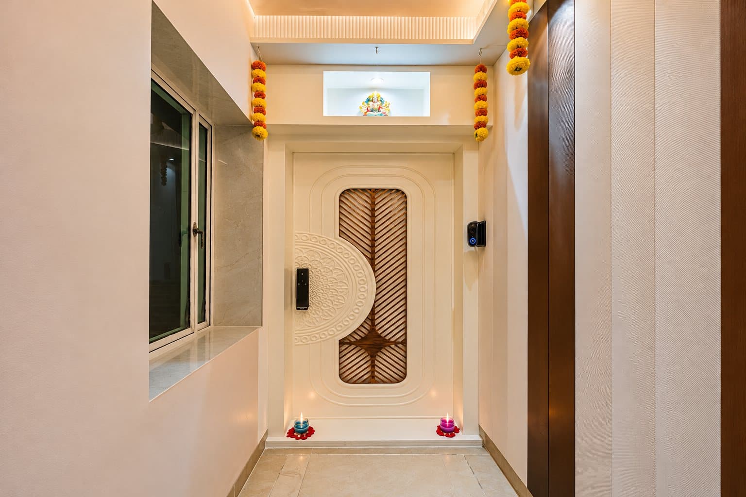 Carved main door with digital lock at a home entrance